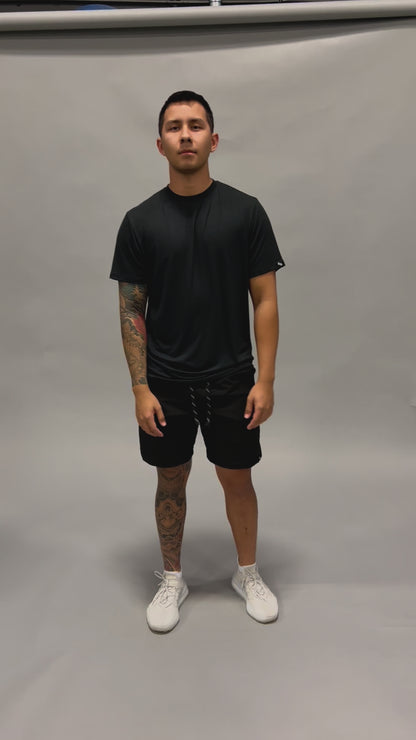 Male modeling ALL IN ALL Supernatural black bamboo shirt and black shorts